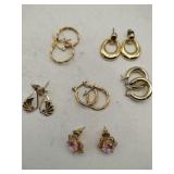 6 pair of gold tone pierced earrings