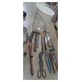 Hand files,channel locks , pruning shears, hack