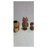 Pottery owl in bird sculpture and wooden carved