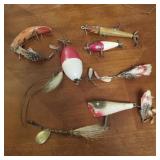 Group of wood fishing lures and bobber
