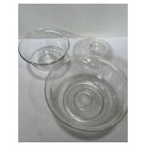 Two glass mixing bowls and glass lid