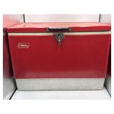 Coleman red and white steel-belted cooler chest,