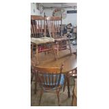 Round wooden dinning table with 6 chairs and 2