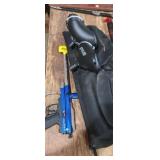 Pirana R6 paintball gun with hoppers and carrying