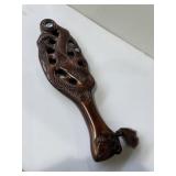Maori Wahaika club featuring intricate wood