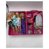 1998 Barbie wardrobe packed with Barbies,