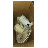 Desk fan and watering can