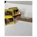 Wooden marble game and gremlins collecting cards