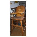Wooden high chair with painted bear