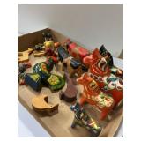 Decorative various wooden horses, cows, roosters,