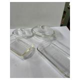 2 Glasbake clear glass baking dishï¿½s and a fire