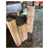 Large pieces of possibly cedar beans and supports