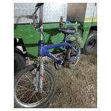 Next branded youth bicycle is identified as a