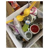 Kitchen timer, lemon, squeezer, silverware, and