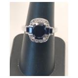 Silver blue /clear Stone ring marked 925 size 7.
