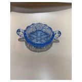 aqua blue glass nappy dish features a sawtooth