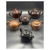 Japan marked brown glazed stoneware teapots,