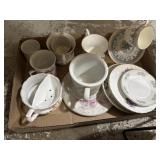 Painted tea cups and saucers, some match