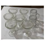 6 sundae dishes and 2 handled mugs