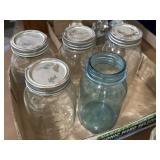 Ball glass jars, one blue, four clear w/ four