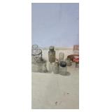 Assortment of small glass bottles and viles