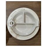 Wellsville ceramic baby plate, has crack on one