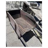 Antique wooden wheelbarrow
