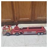 Vintage metal red fire truck toy 30" long.