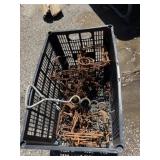 Crate full of animal traps and dog tie out