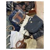 Large collection of handbags and purses