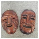 Vintage hand carved face mask wall hangings.