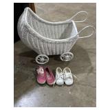 Wicker doll carriage and 2 pairs baby shoes