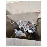 Box of glass pitchers and decanters.