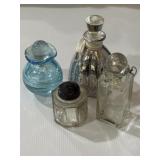 Glass bottles with stoppers, small jar