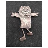 Silver boy brooch Marked Sterling.   .890oz