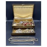 Older jewelry box with contents