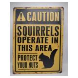 Caution squirrels metal sign 12x16