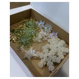 Glass and plastic snowflake ornaments