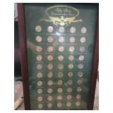 50 states commemorative coins.  (Glass broken)