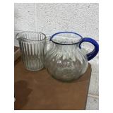 Pair of solid glass pitchers