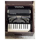 25 key vintage Ballarini accordion in hard shell