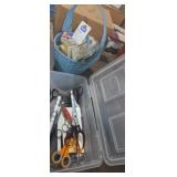 Scissor assortment and basket of hems and tape