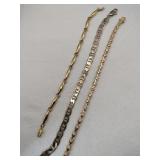3 gold tone bracelets