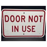 Authentic metal "door not in use" sign, 12 x 18"
