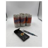 Billy beer cans. And darts.