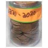 A Small Jar Full of Wheat Pennies Over 200 +