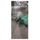 Concrete gnome and frog garden decoration
