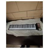 Hand Roll roll-up portable piano. Tested, works.