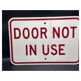 Authentic metal "door not in use" sign, 12 x 18"
