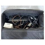 Video camera camcorders and cables in big zip up